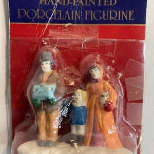 Dickens collectibles hand painted porcelain figure man woman and boy